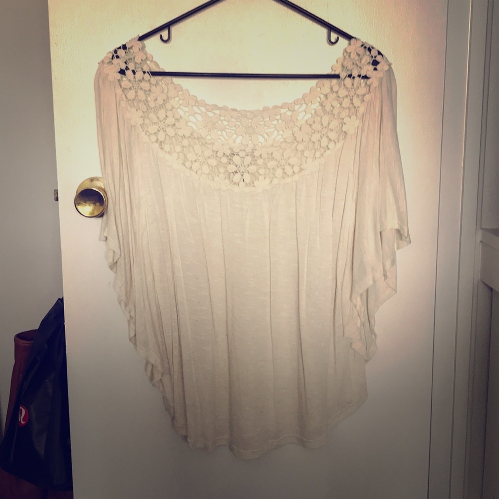 Flowy blouse with floral neckline